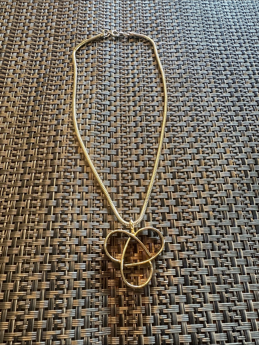 Gold colored knot necklace great condition thick cord chain chunky pendant